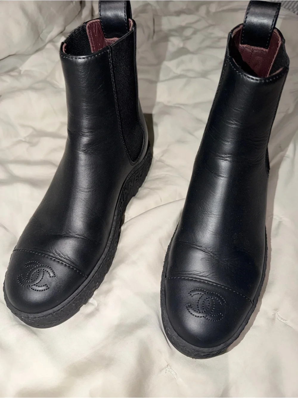 CHANEL Black Leather Platform Chelsea Booties with Gold CC Accent rubber sole